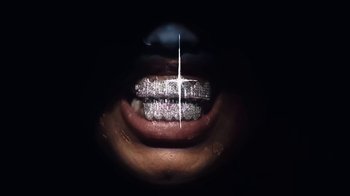 Movie still from “Bree Runway - Just Like That” (2024), directed by Pietro Biz Biasia – Extreme Close Up shot, Overhead angle