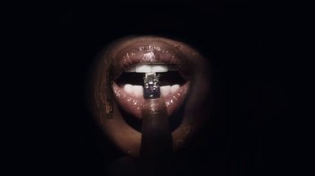 Movie still from “Bree Runway - Just Like That” (2024), directed by Pietro Biz Biasia – Extreme Close Up shot, Overhead angle