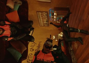 Movie still from “Metro Boomin & Future - Superhero (Heroes & Villains)” (2022) – Medium shot, Overhead angle