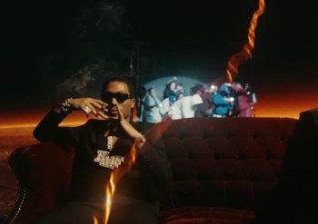 Movie still from “Metro Boomin & Future - Superhero (Heroes & Villains)” (2022) – Medium shot, Low angle