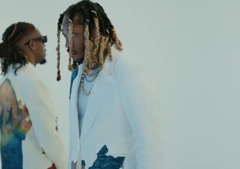Movie still from “Metro Boomin & Future - Superhero (Heroes & Villains)” (2022) – Medium shot, Over the shoulder angle
