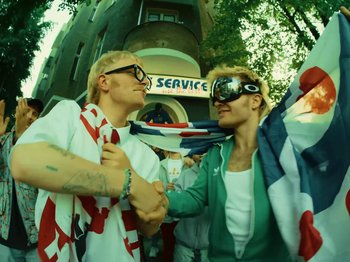 Movie still from “Joost, Ski Aggu & Otto Waalkes - Friesenjung” (2023), directed by Joost Klein – Medium shot, High angle