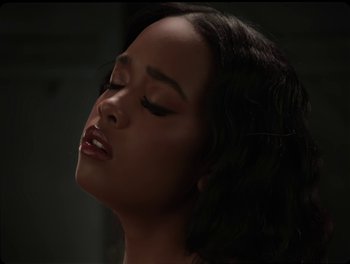 Movie still from “USHER, H.E.R. - Risk It All” (2024), directed by Dave Meyers – Close Up shot, Low angle