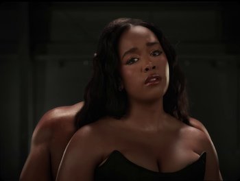 Movie still from “USHER, H.E.R. - Risk It All” (2024), directed by Dave Meyers – Close Up shot, Low angle