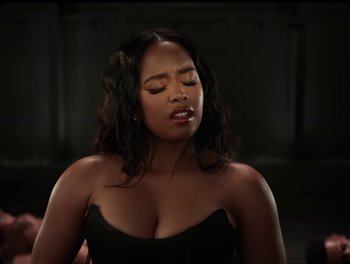 Movie still from “USHER, H.E.R. - Risk It All” (2024), directed by Dave Meyers – Close Up shot, Low angle