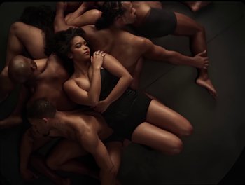 Movie still from “USHER, H.E.R. - Risk It All” (2024), directed by Dave Meyers – Wide shot, Overhead angle