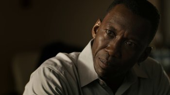 Movie still from “True Detective” (2014), created by Issa López – A person wearing a white shirt; Close Up shot, Low angle