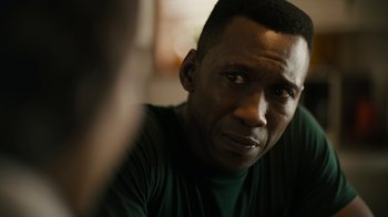 Movie still from “True Detective” (2014), created by Issa López – A person looking at the camera; Close Up shot, Over the shoulder angle