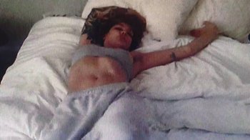 Movie still from “Donna Missal - Sex is Good” (2021), directed by Rodrigo Inada – Medium shot, Overhead angle