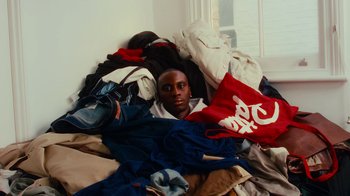 Movie still from “Downtown Kayoto - Changed it” (2023), directed by Joe Howat – Medium shot, Overhead angle