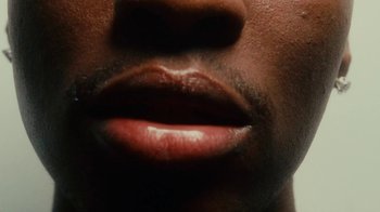 Movie still from “Downtown Kayoto - Changed it” (2023), directed by Joe Howat – Extreme Close Up shot, Low angle