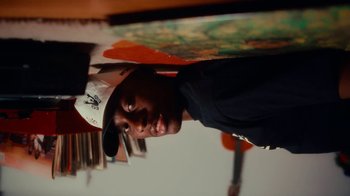 Movie still from “Downtown Kayoto - Changed it” (2023), directed by Joe Howat – Close Up shot, Overhead angle