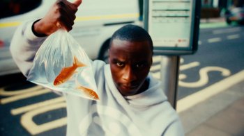 Movie still from “Downtown Kayoto - Changed it” (2023), directed by Joe Howat – Close Up shot, High angle