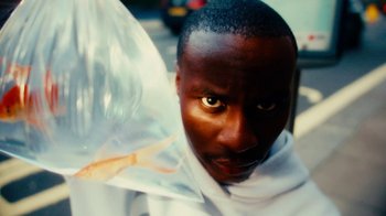 Movie still from “Downtown Kayoto - Changed it” (2023), directed by Joe Howat – Close Up shot, High angle