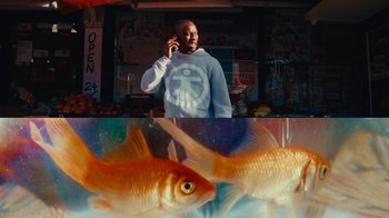 Movie still from “Downtown Kayoto - Changed it” (2023), directed by Joe Howat – Medium shot, Low angle