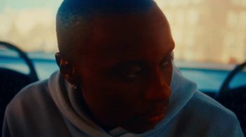 Movie still from “Downtown Kayoto - Changed it” (2023), directed by Joe Howat – Close Up shot, High angle