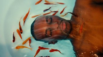 Movie still from “Downtown Kayoto - Changed it” (2023), directed by Joe Howat – Close Up shot, Overhead angle