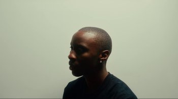 Movie still from “Downtown Kayoto - Changed it” (2023), directed by Joe Howat – Close Up shot, High angle