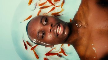 Movie still from “Downtown Kayoto - Changed it” (2023), directed by Joe Howat – Close Up shot, Overhead angle