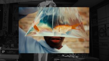 Movie still from “Downtown Kayoto - Changed it” (2023), directed by Joe Howat – Extreme Close Up shot, Overhead angle