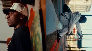 Movie still from “Downtown Kayoto - Changed it” (2023), directed by Joe Howat – Medium shot, Low angle