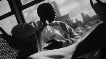 Movie still from “Downtown Kayoto - Changed it” (2023), directed by Joe Howat – Medium shot, Low angle