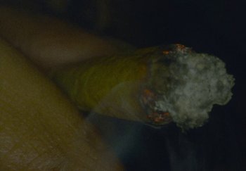 Movie still from “21 Savage - redrum” (2024), directed by Danny Seth – Extreme Close Up shot, Overhead angle