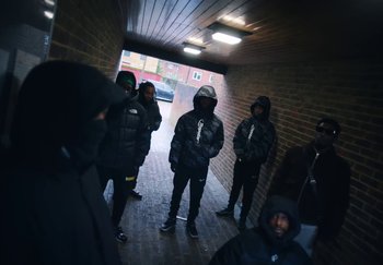 Movie still from “21 Savage - redrum” (2024), directed by Danny Seth – Wide shot, High angle