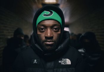 Movie still from “21 Savage - redrum” (2024), directed by Danny Seth – Close Up shot, Low angle