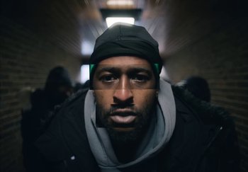 Movie still from “21 Savage - redrum” (2024), directed by Danny Seth – Extreme Close Up shot, Low angle