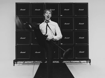 Movie still from “The Dare - Perfume” (2024), directed by Nick Harwood – Medium shot, Low angle