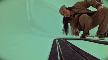 Movie still from “Carly Gibert - WILLOW” (2024), directed by Carly Gibert – Medium shot, Low angle