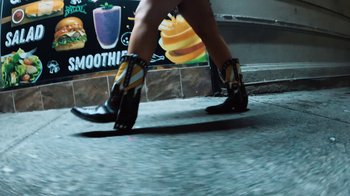 Movie still from “Latto - Sunday Service” (2024), directed by Hidji World – Medium shot, Low angle