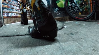 Movie still from “Latto - Sunday Service” (2024), directed by Hidji World – Extreme Close Up shot, Low angle