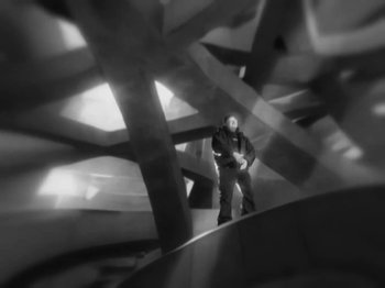 Movie still from “Manga Saint Hilare, MoreNight feat. P Money & JME - Alarm Bells” (2024), directed by Will Norman – Wide shot, Low angle