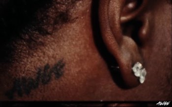 Movie still from “A$AP Rocky - D.M.B.” (2022), directed by A$AP Rocky – Extreme Close Up shot, Overhead angle