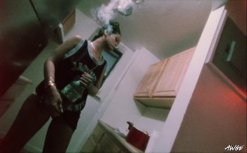 Movie still from “A$AP Rocky - D.M.B.” (2022), directed by A$AP Rocky – Medium shot, Low angle