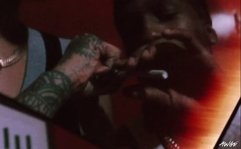 Movie still from “A$AP Rocky - D.M.B.” (2022), directed by A$AP Rocky – Extreme Close Up shot, Low angle