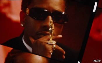 Movie still from “A$AP Rocky - D.M.B.” (2022), directed by A$AP Rocky – Extreme Close Up shot, Low angle
