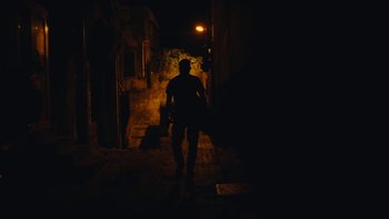 Movie still from “Bourne - Ere We Go” (2022), directed by Truman – Extreme Wide shot, Low angle