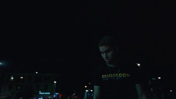 Movie still from “Bourne - Ere We Go” (2022), directed by Truman – Medium shot, Low angle