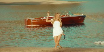 Movie still from “Sabrina Carpenter - Espresso” (2024), directed by Dave Meyers – Wide shot, High angle