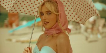 Movie still from “Sabrina Carpenter - Espresso” (2024), directed by Dave Meyers – Close Up shot, Low angle