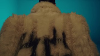 Movie still from “Offset ft. Moneybagg Yo - CODE” (2022), directed by Claire Arnold – Extreme Close Up shot, Overhead angle