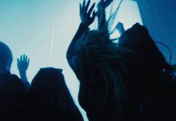 Movie still from “Yeat - Riot & Set it off” (2024), directed by Trey Lyons – Medium shot, Low angle