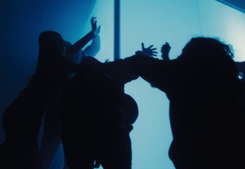 Movie still from “Yeat - Riot & Set it off” (2024), directed by Trey Lyons – Medium shot, Low angle