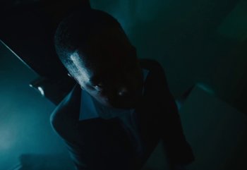 Movie still from “Yeat - Riot & Set it off” (2024), directed by Trey Lyons – Extreme Close Up shot, Low angle