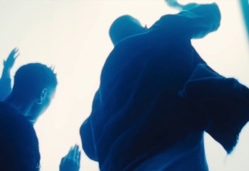 Movie still from “Yeat - Riot & Set it off” (2024), directed by Trey Lyons – Medium shot, Low angle