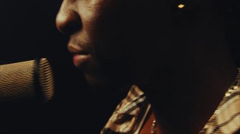 Movie still from “Downtown Kayoto - Came Thru” (2024), directed by Joe Howat – Extreme Close Up shot, Low angle