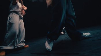 Movie still from “Downtown Kayoto - Came Thru” (2024), directed by Joe Howat – Medium shot, Low angle